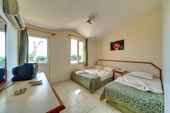 Introduce sus fechas y vea precios de hoteles última hora en Kemer