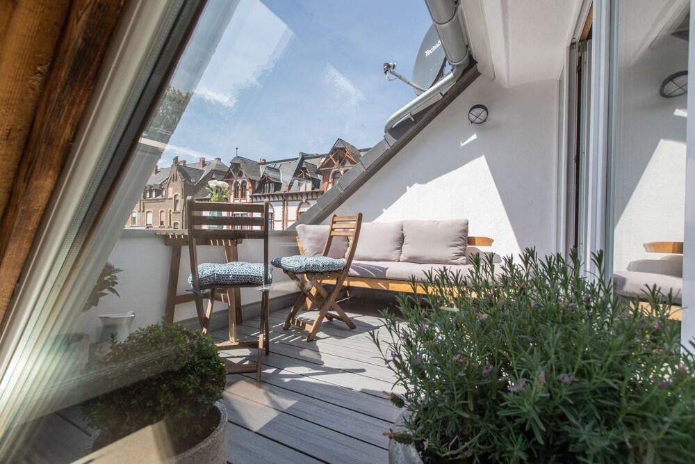 loft keane - vintage meets modernity over the roofs of koblenz