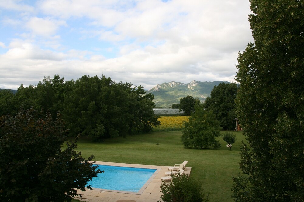 in all seasons, house in lush greenery   private pool and forest