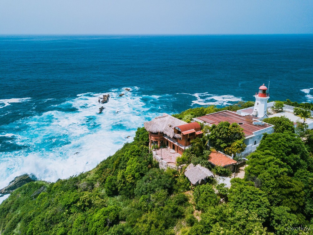 handcrafted 2 ( ) story cliff-side dwelling with sweeping ocean