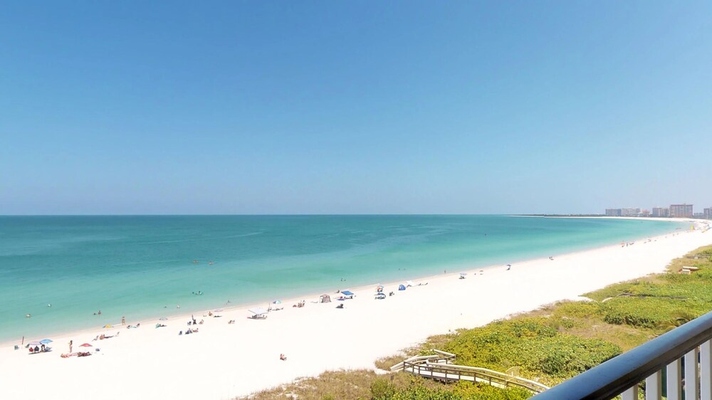 steps away from the soft, white, sandy beaches of beautiful